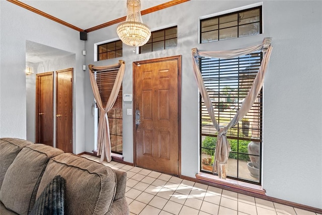 4924 Byron Cir, Yukon, OK 73099 - entryway featuring a chandelier, crown molding, and light tile patterned floors