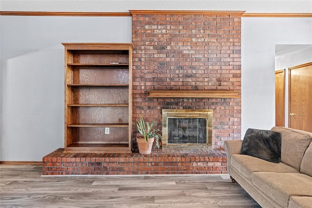 4924 Byron Cir, Yukon, OK 73099 - living area featuring wood finished floors and a fireplace