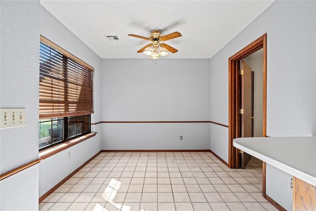 4924 Byron Cir, Yukon, OK 73099 - unfurnished room with ceiling fan and baseboards