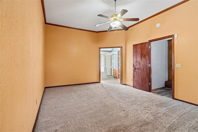 4924 Byron Cir, Yukon, OK 73099 - unfurnished bedroom with crown molding, carpet, a textured wall, ensuite bathroom, and a ceiling fan