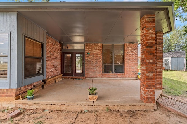 4924 Byron Cir, Yukon, OK 73099 - property entrance with brick siding and a patio