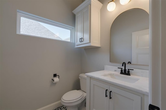 3624 Utica Square Dr, Edmond, OK 73034 - half bathroom with vanity and toilet