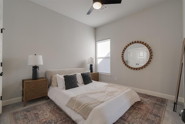 3624 Utica Square Dr, Edmond, OK 73034 - carpeted bedroom with baseboards and ceiling fan
