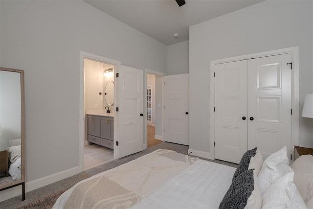 3624 Utica Square Dr, Edmond, OK 73034 - carpeted bedroom with a closet and connected bathroom
