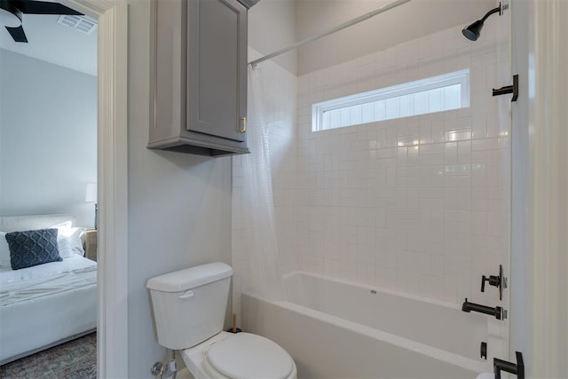 3624 Utica Square Dr, Edmond, OK 73034 - ensuite bathroom with shower / bath combination with curtain and a ceiling fan