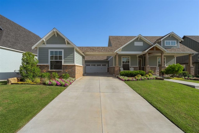 3624 Utica Square Dr, Edmond, OK 73034 - craftsman house featuring concrete driveway, a front lawn, covered porch, and a garage