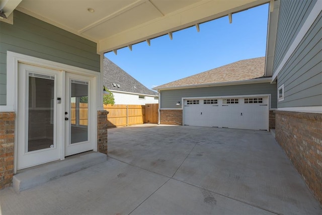 3624 Utica Square Dr, Edmond, OK 73034 - view of patio with a garage