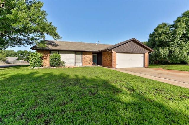 1229 S Gemini Rd, Edmond, OK 73003 - view of front facade featuring an attached garage, brick siding, a front lawn, and driveway