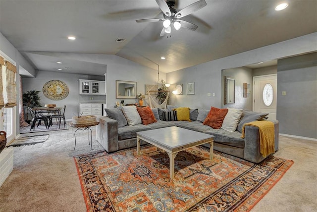 1229 S Gemini Rd, Edmond, OK 73003 - carpeted living room with a ceiling fan, lofted ceiling, and recessed lighting