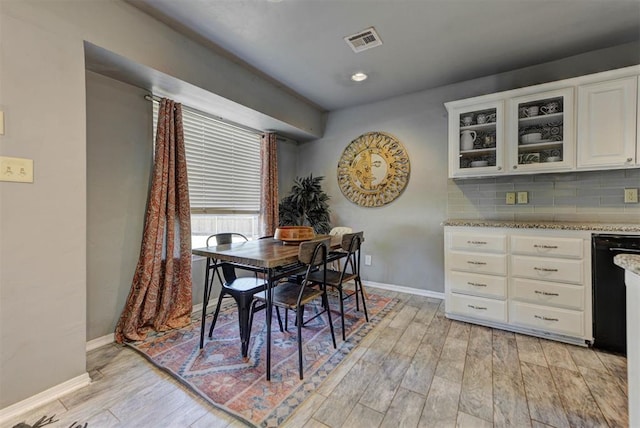 1229 S Gemini Rd, Edmond, OK 73003 - dining area featuring light wood-style flooring