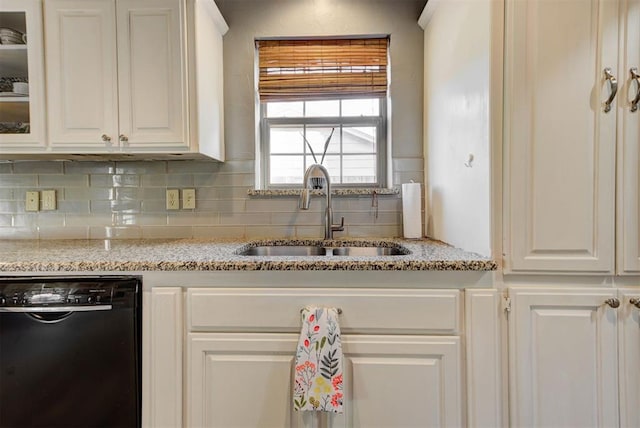 1229 S Gemini Rd, Edmond, OK 73003 - kitchen with dishwasher, backsplash, glass insert cabinets, and white cabinets