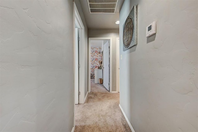 1229 S Gemini Rd, Edmond, OK 73003 - hall with light colored carpet and baseboards