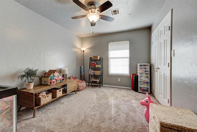 1229 S Gemini Rd, Edmond, OK 73003 - rec room with carpet floors and a ceiling fan
