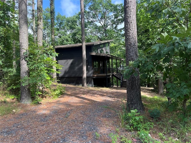 179 Long Pine Trl, Broken Bow, OK 74728 - view of front of home featuring stairs and a wooden deck