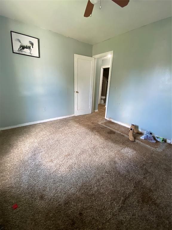 2451 NW 42nd St, Oklahoma City, OK 73112 - unfurnished bedroom with carpet flooring and ceiling fan