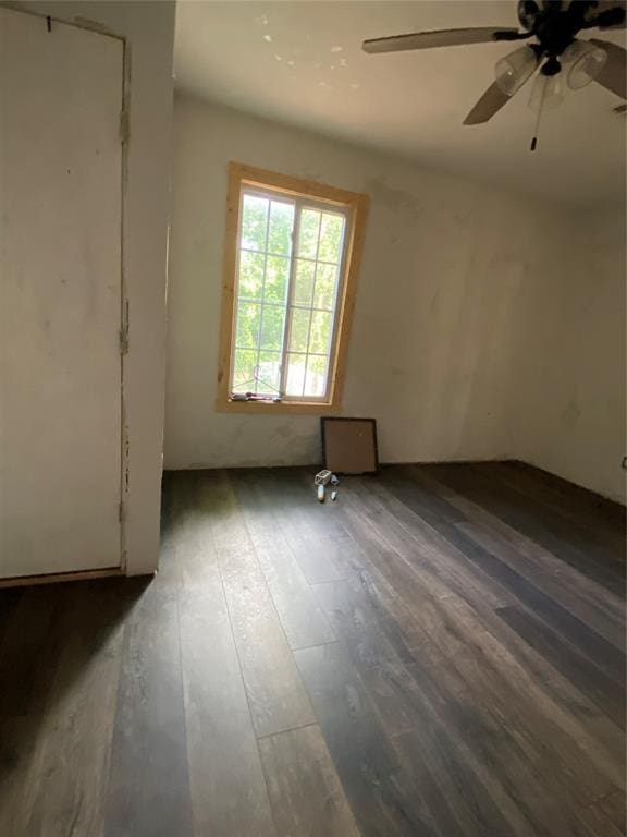 2451 NW 42nd St, Oklahoma City, OK 73112 - spare room featuring hardwood / wood-style floors and a ceiling fan