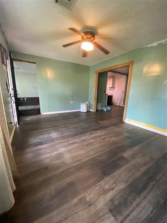 2451 NW 42nd St, Oklahoma City, OK 73112 - unfurnished living room featuring wood finished floors and ceiling fan