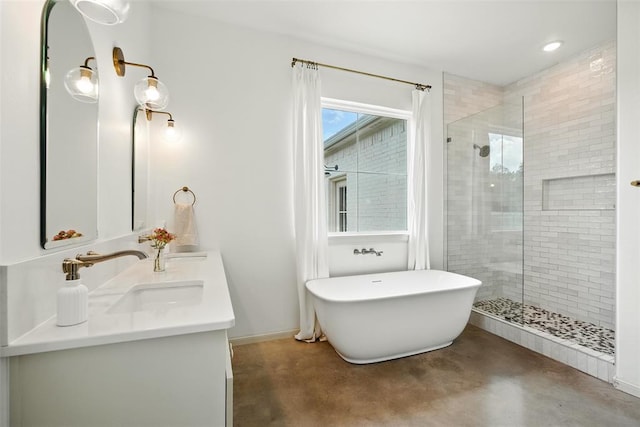 1006 Dorsi Way, Newcastle, OK 73065 - bathroom with finished concrete flooring, double vanity, a tile shower, and a freestanding bath
