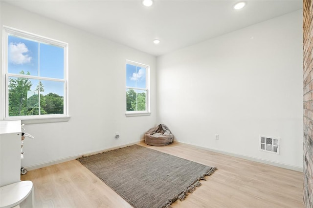 1006 Dorsi Way, Newcastle, OK 73065 - unfurnished room with wood finished floors and recessed lighting