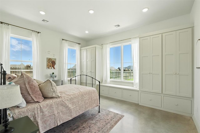 1006 Dorsi Way, Newcastle, OK 73065 - bedroom featuring concrete floors and recessed lighting