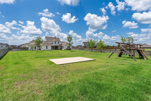 1006 Dorsi Way, Newcastle, OK 73065 - fenced backyard with a playground and a patio