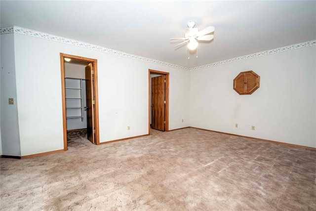 511 N Turner Rd, Chandler, OK 74834 - spare room featuring a ceiling fan and carpet
