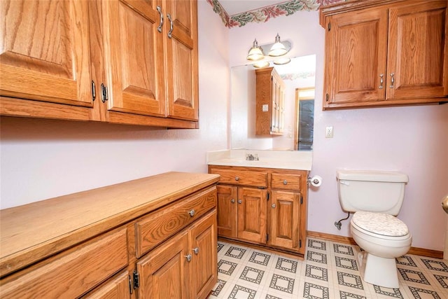 511 N Turner Rd, Chandler, OK 74834 - bathroom featuring vanity and toilet