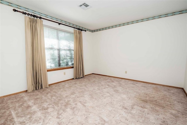 511 N Turner Rd, Chandler, OK 74834 - spare room with baseboards and light colored carpet