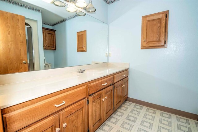 511 N Turner Rd, Chandler, OK 74834 - full bath with vanity, a shower with door, and tile patterned floors