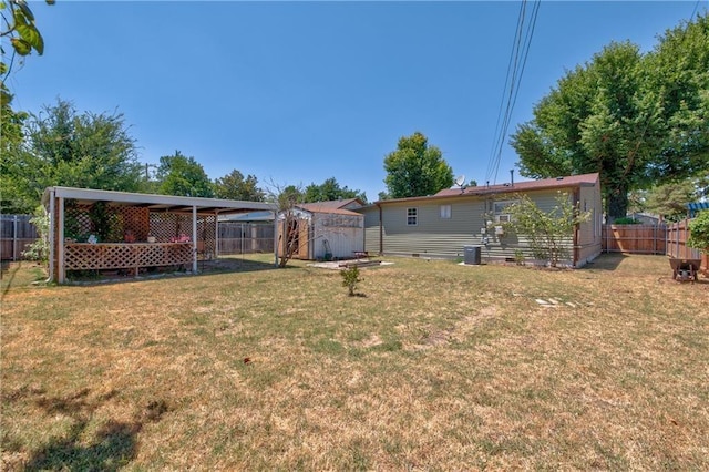 7010 NW 44th St, Bethany, OK 73008 - fenced backyard featuring a storage unit