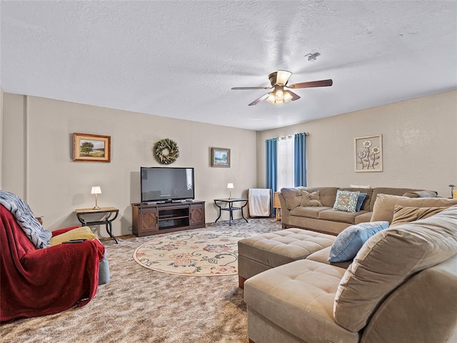 1008 County Road 1580, Marlow, OK 73055 - living room with ceiling fan, carpet floors, and a textured ceiling