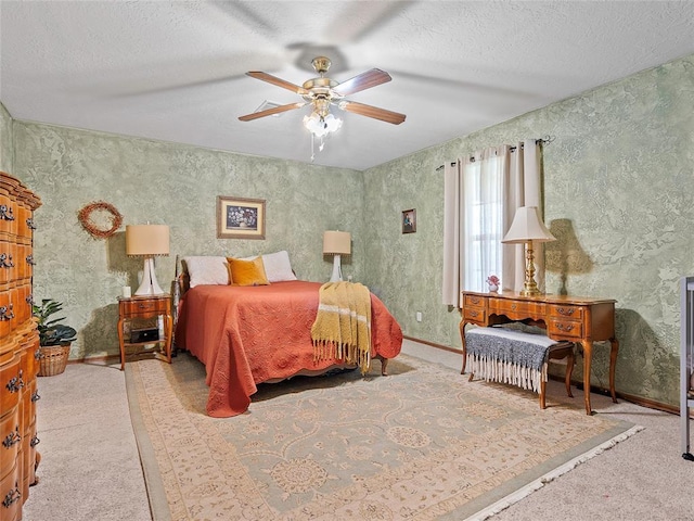 1008 County Road 1580, Marlow, OK 73055 - bedroom with carpet floors, a textured ceiling, and ceiling fan
