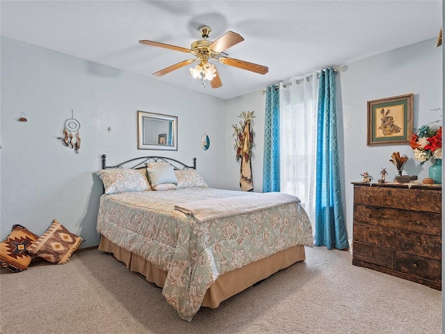 1008 County Road 1580, Marlow, OK 73055 - bedroom featuring light carpet and a ceiling fan