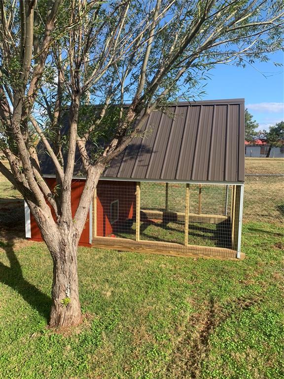 1008 County Road 1580, Marlow, OK 73055 - view of grassy yard with exterior structure and an outdoor structure