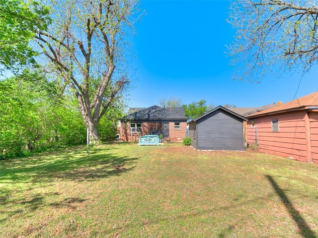 2212 N Kelham Ave, Oklahoma City, OK 73111 - view of green lawn with an outbuilding