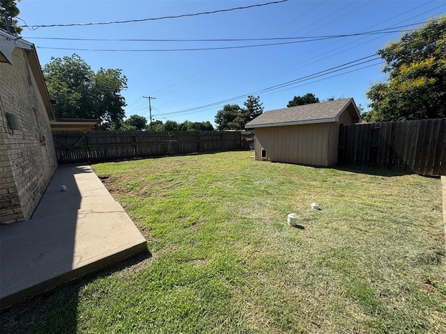 fenced backyard with a shed