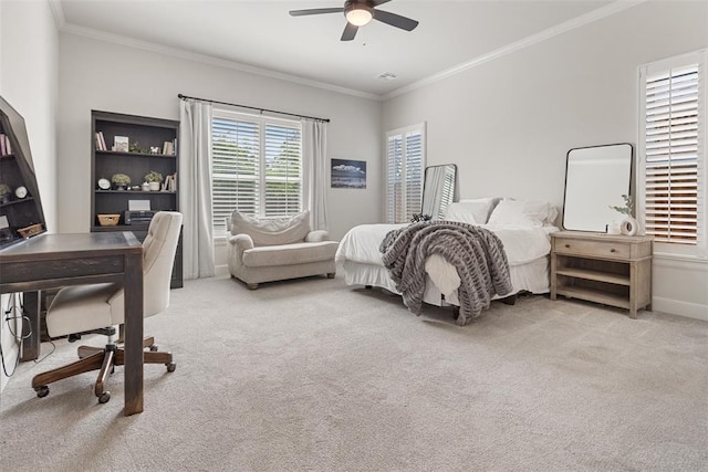 1724 Campus Corner Pl, Edmond, OK 73034 - carpeted bedroom featuring ornamental molding, a desk, and a ceiling fan