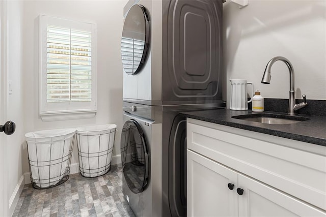 1724 Campus Corner Pl, Edmond, OK 73034 - laundry room with estacked washer and dryer and cabinet space
