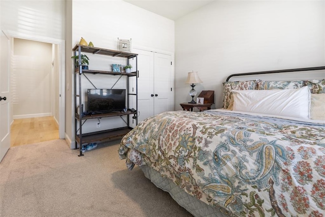 1724 Campus Corner Pl, Edmond, OK 73034 - carpeted bedroom with a closet and baseboards