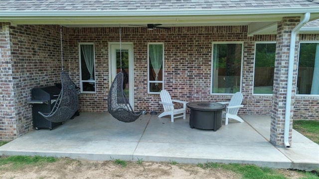 1724 Campus Corner Pl, Edmond, OK 73034 - view of patio featuring an outdoor fire pit and a ceiling fan