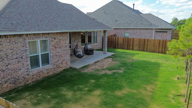 1724 Campus Corner Pl, Edmond, OK 73034 - fenced backyard featuring a patio