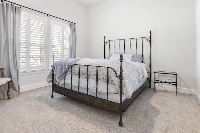 1724 Campus Corner Pl, Edmond, OK 73034 - bedroom featuring carpet and multiple windows