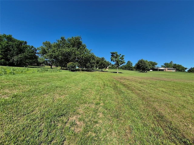 24400 Blackjack Rd, Perry, OK 73077 - view of green lawn with a rural view