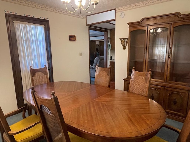 24400 Blackjack Rd, Perry, OK 73077 - dining space with a chandelier and plenty of natural light
