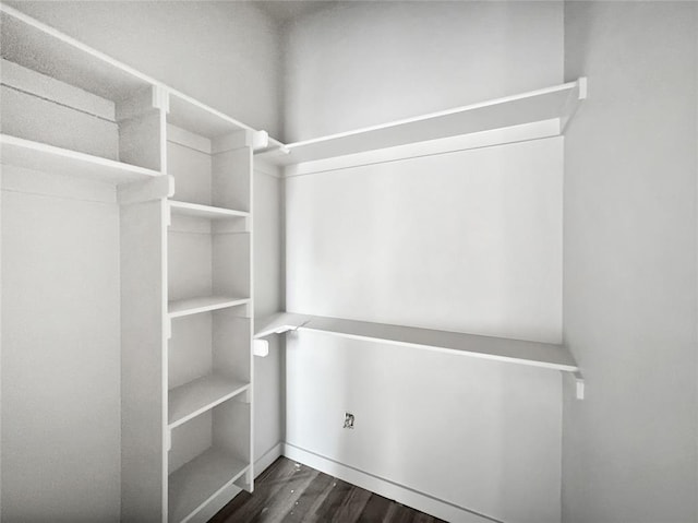 1101 N Tucker Ave, Shawnee, OK 74801 - walk in closet featuring dark wood finished floors