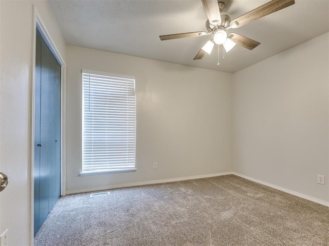 11516 N Barnes Ave, Oklahoma City, OK 73120 - unfurnished room featuring carpet floors and a ceiling fan