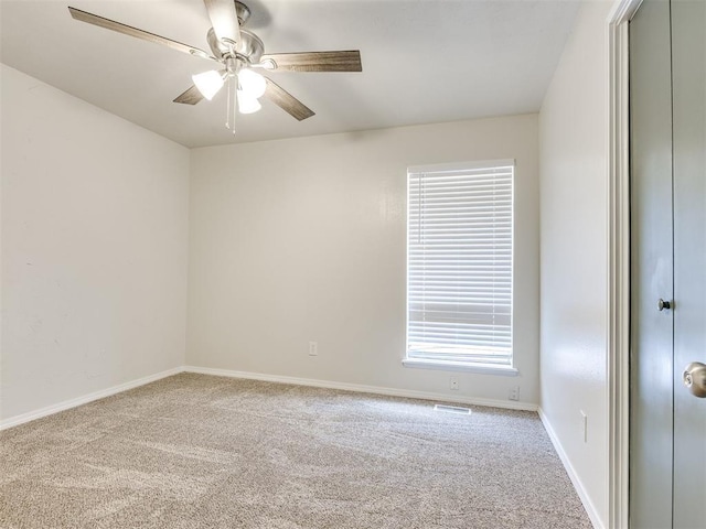 11516 N Barnes Ave, Oklahoma City, OK 73120 - carpeted empty room featuring a ceiling fan and baseboards