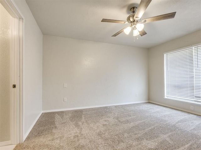 11516 N Barnes Ave, Oklahoma City, OK 73120 - spare room with carpet flooring and a ceiling fan