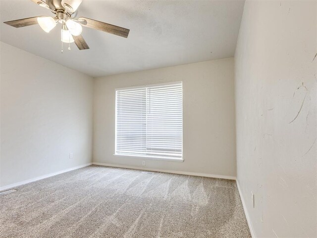 11516 N Barnes Ave, Oklahoma City, OK 73120 - unfurnished room with carpet flooring and ceiling fan