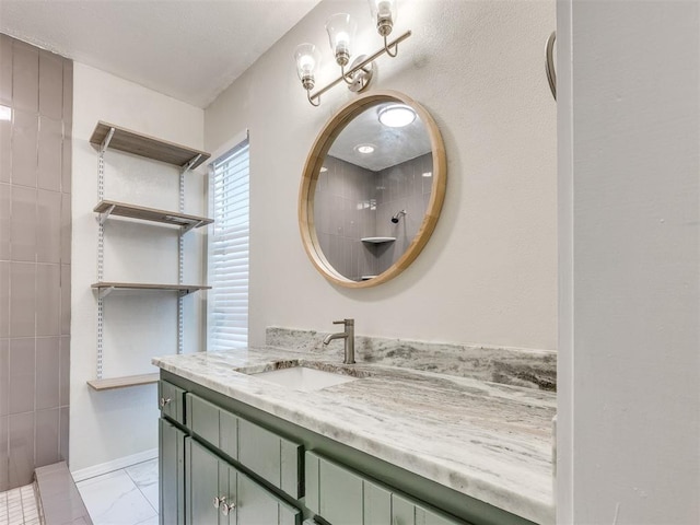11516 N Barnes Ave, Oklahoma City, OK 73120 - bathroom with vanity, marble finish floors, and a tile shower